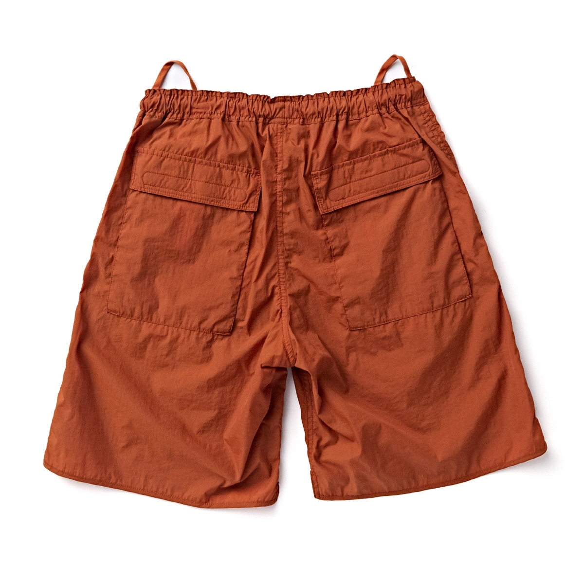 orange nylon shorts