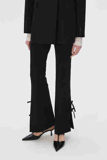 KUME(쿠메) Ribbon Tie Bootcut Pants, Black | S.I.VILLAGE (에스아이빌리지)